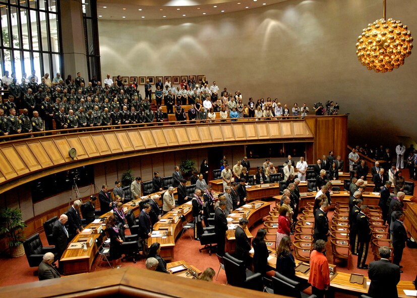 Audience members stand and pray at a special ceremony honoring, 28 service members who were posthumously presented the Hawaii Medal of Honor at the State Capitol, Honolulu, Hawaii, March 23, 2010. United States Air Force, Pacific Air Forces, First Lieutenant Roslyn L. Schulte was among the service members who received the prestigious medal. The Hawaii Medal of Honor was created in 2005 to recognize the heroism of those members of the U.S. armed forces with links to Hawaii who are killed in action while serving our country as part of Operation Iraqi Freedom and Operation Enduring Freedom in Iraq and Afghanistan. The presentation of the Hawaii Medal of Honor was the first of its kind in the nation, and has become the model for similar ceremonies in other states. (U.S. Air Force photo/Tech. Sgt. Jerome S. Tayborn)