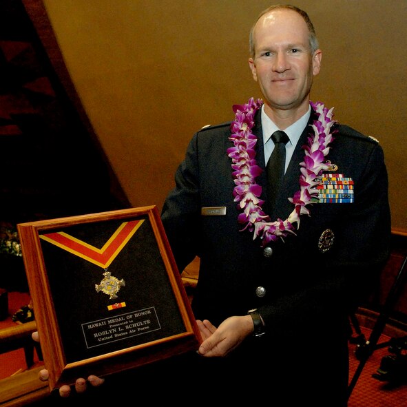 U. S. Air Force 1st Lt. Roslyn L. Schulte?s Hawaii Medal of Honor was presented posthumously to her supervisor Lt. Col. Christopher Sartorius from the 613th Air and Space Operations Center, by the Hawaii Legislature, at the State Capitol, Hawaii, March 23, 2010. Lt. Col. Sartorius accepted the medal and citation on behalf of 1st Lt. Schulte and her family.  She was among 28 fallen service members being awarded the Hawaii Medal of Honor during a special ceremony. The Hawaii Medal of Honor was created in 2005 to recognize the heroism of those members of the U.S. armed forces with links to Hawaii who are killed in action while serving our country as part of Operation Iraqi Freedom and Operation Enduring Freedom in Iraq and Afghanistan. The presentation of the Hawaii Medal of Honor was the first of its kind in the nation, and has become the model for similar ceremonies in other states. (U.S. Air Force photo/Tech. Sgt. Jerome S. Tayborn)