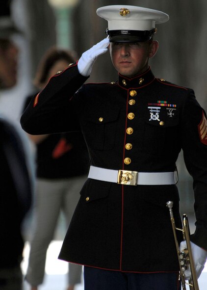 A U. S. Marine Corps Staff Sergeant, salutes after a 21-Gun Salute and the playing of Taps, to honor 28 fallen service members being presented the Hawaii Medal of Honor posthumously, during a special ceremony at the State Capitol, Honolulu, Hawaii, March 23, 2010.  The Hawaii Medal of Honor was created in 2005 to recognize the heroism of those members of the U.S. armed forces with links to Hawaii who are killed in action while serving our country as part of Operation Iraqi Freedom and Operation Enduring Freedom in Iraq and Afghanistan. The presentation of the Hawaii Medal of Honor was the first of its kind in the nation, and has become the model for similar ceremonies in other states. (U.S. Air Force photo/Tech. Sgt. Jerome S. Tayborn)