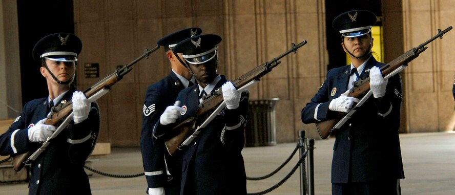 Members of Joint Base Hickam Pearl Harbor?s honor guard perform a 21-Gun Salute, to honor 28 fallen service members being presented the Hawaii Medal of Honor posthumously, during a special ceremony at the State Capitol, Honolulu, Hawaii, March 23, 2010.  The Hawaii Medal of Honor was created in 2005 to recognize the heroism of those members of the U.S. armed forces with links to Hawaii who are killed in action while serving our country as part of Operation Iraqi Freedom and Operation Enduring Freedom in Iraq and Afghanistan. The presentation of the Hawaii Medal of Honor was the first of its kind in the nation, and has become the model for similar ceremonies in other states. (U.S. Air Force photo/Tech. Sgt. Jerome S. Tayborn)