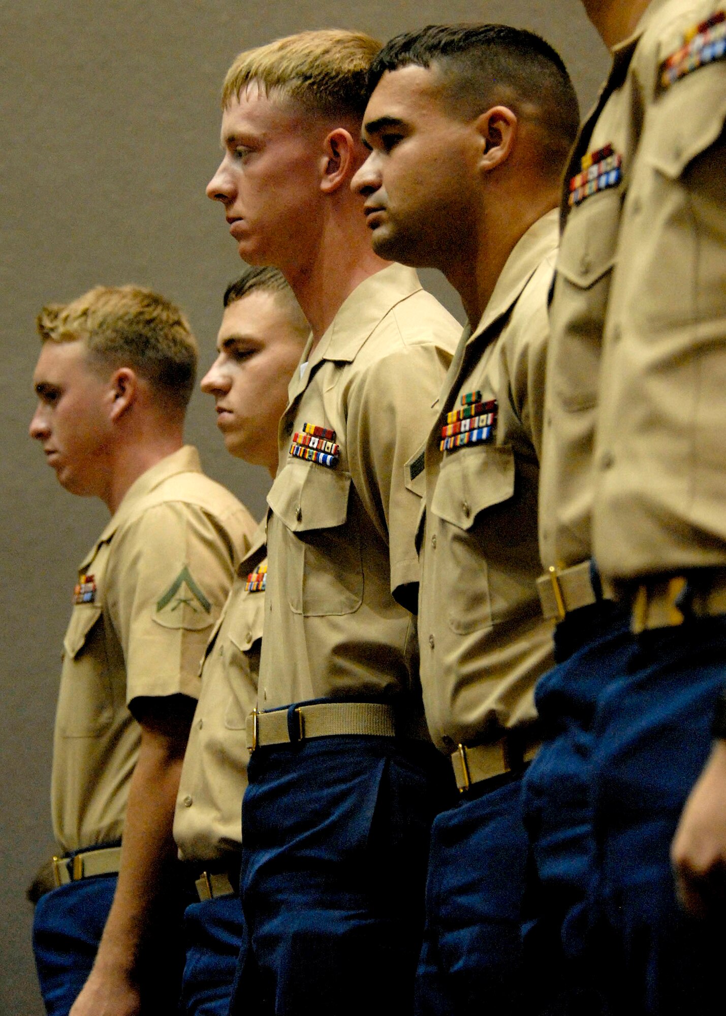 U.S. Marines stand at attention to pay respects as the names of their fellow fallen service members are called during a special Hawaii Medal of Honor ceremony, at the State Capitol, Honolulu, Hawaii, March 23, 2010.  In all, 28 recipients were posthumously awarded the Hawaii Medal of Honor. United States Air Force, Pacific Air Forces, First Lieutenant Roslyn L. Schulte was among the service members who were posthumously awarded the prestigious medal. The Hawaii Medal of Honor was created in 2005 to recognize the heroism of those members of the U.S. armed forces with links to Hawaii who are killed in action while serving our country as part of Operation Iraqi Freedom and Operation Enduring Freedom in Iraq and Afghanistan. The presentation of the Hawaii Medal of Honor was the first of its kind in the nation, and has become the model for similar ceremonies in other states. (U.S. Air Force photo/Tech. Sgt. Jerome S. Tayborn)