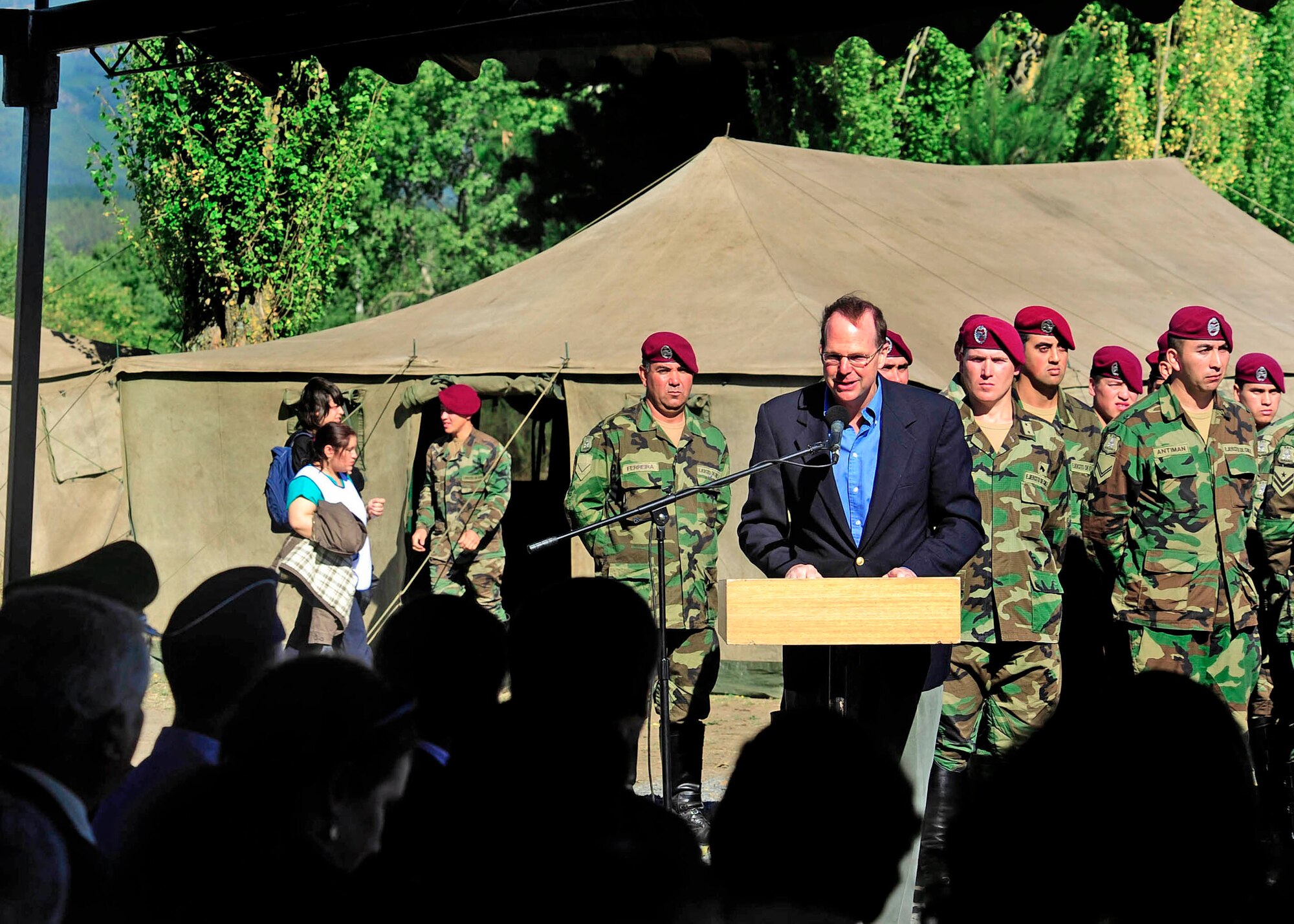 Paul Simons, the U.S. ambassador to Chile, speaks during a ceremony March 24, 2010, to recognize the donation of the expeditionary hospital to the citizens of Angol, Chile. While the local hospital in Angol is being rebuilt, this medical facility will provide much needed space to provide medical care for the nearly 110,000 in the Angol region. (U.S. Air Force photo/Senior Airman Tiffany Trojca)