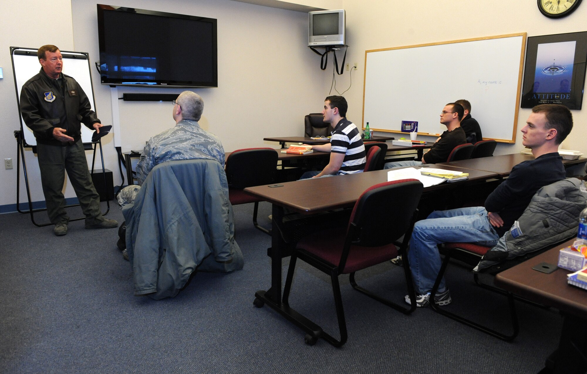 ELMENDORF AIR FORCE BASE, Alaska -- Lt. Gen. Dana Atkins, 11th Air Force commander, speaks to a class of Airmen at the Wired Cafe March 18. This class is the first of many classes that will be held at the Wired Cafe due to its central location in the dormitory campus. 

The cafe was chosen in an "effort to ignite CCAF pathway for unaccompanied Airmen," said Senior Master Sgt. Matthew Bedard. "The cafe is in close proximity to their rooms." 

The first class, offered by Wayland Baptist University, was an overwhelming success and received a high number of applications. The University of Anchorage Alaska will soon be holding an ancient history class and Embry Riddle plans to start an economics course for the Airmen. To find out more information about the classes contact Sergeant Bedard at 552-9949 or email him at Matthew.bedard@us.af.mil. (Air Force photo by Senior Airman Cynthia Spalding)
