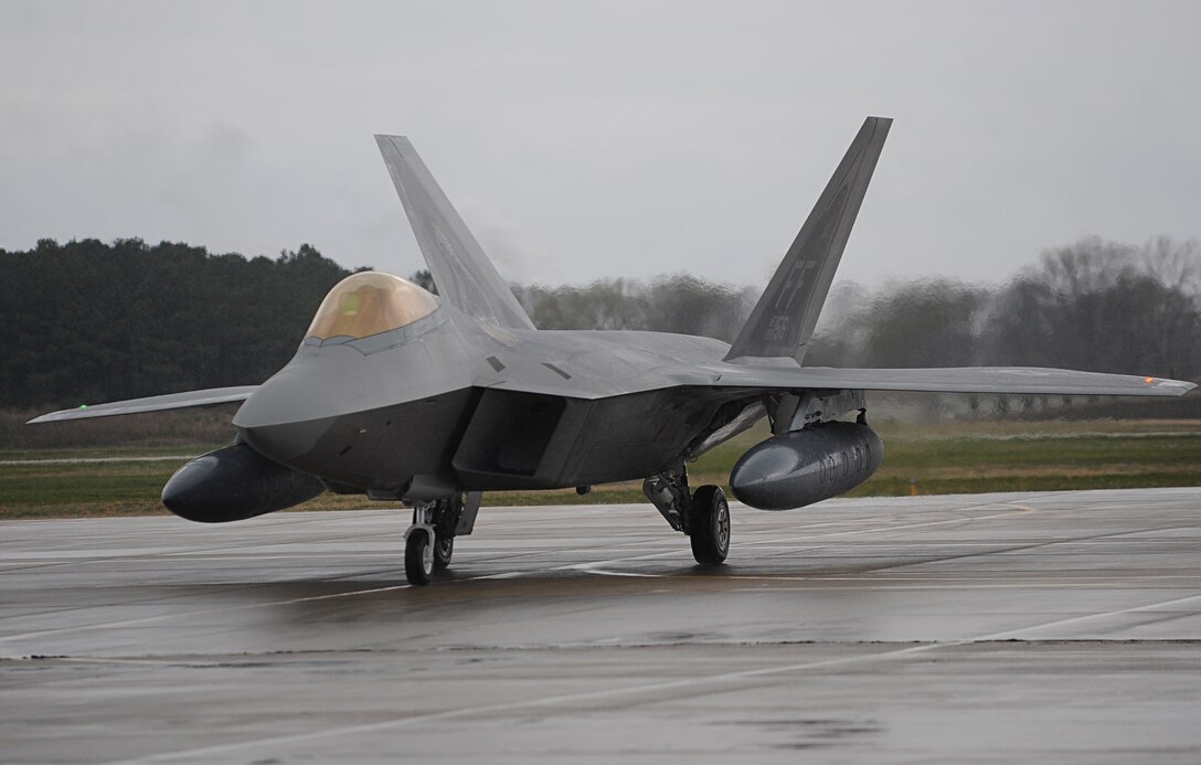 LANGLEY AIR FORCE BASE, Va. -- An F-22A Raptor taxis into "Base X" during a Phase I Operational Readiness Exercise here March 26. This ORE generated more raptors than any previous Phase I ORE at Langley. (U.S. Air Force photo/Airman Rebecca Montez)