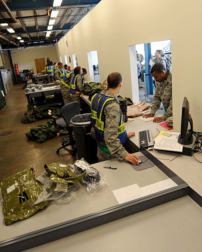 LANGLEY AIR FORCE BASE, Va. -- Airmen from the 633d Logistics and Readiness Squadron process Airmen through the mobility equipment issue portion of the personnel deployment function line during a Phase I Operational Readiness Exercise here March 26. Wing Exercise Evaluation Team members will spend two days assessing the ability of the 633d Air Base Wing, 1st Fighter Wing, and 192d Fighter Wing to deploy cargo, aircraft and Airmen within a limited timeframe.
(U.S. Air Force photo/Airman Rebecca Montez)