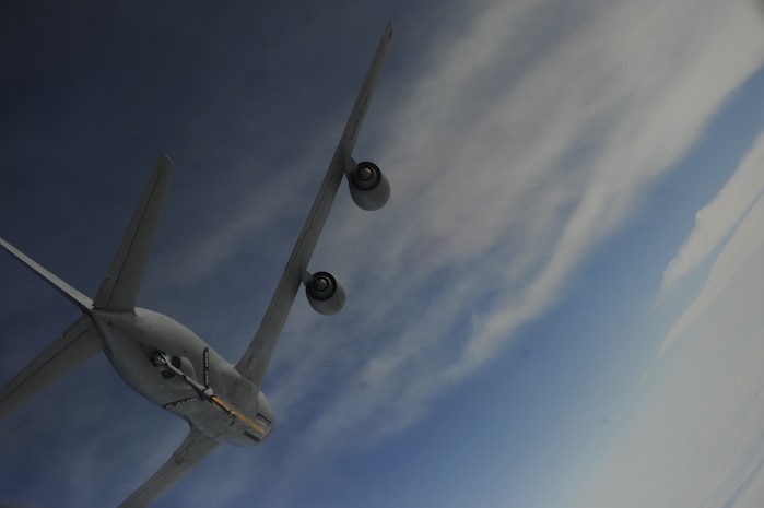 A MacDill AFB, Fla., KC-135 Stratotanker stabilizes itself to prepare for in-flight refueling operations with a Charleston C-17 Globemaster III during a training mission March 12, 2010. During an in-flight refuel, the amount of fuel transferred is coordinated prior to the mission and the precise amount needed to complete the mission is delivered. (U.S. Air Force photo/Staff Sgt. Eric Harris)