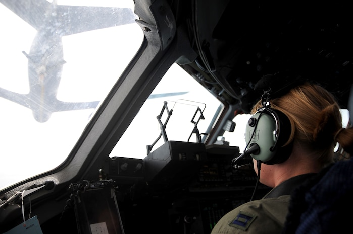 Capt. Kristen Franke, 15th Airlift Squadron pilot, maneuvers a Charleston C-17 Globemaster III behind a MacDill AFB, Fla., KC-135 Stratotanker for in-flight refueling during a local training mission March 9, 2010. The refueling capability of the Air Force allows the air mobility mission to reach all parts of the world, enabling strong U.S. power projection. (U.S. Air Force photo/Tech. Sgt. Dennis Henry)
