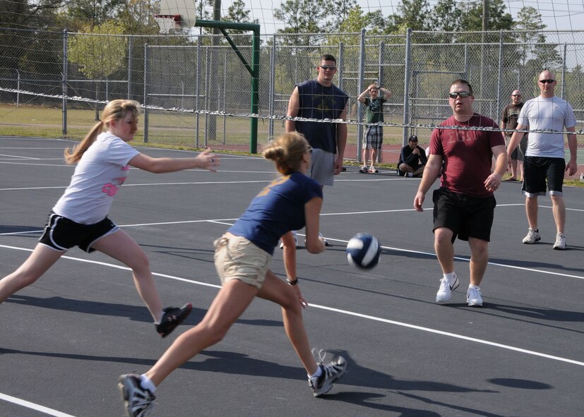 Members of the Tennessee Air National Guard’s 119th Command and Control Squadron unwind with a volleyball match March 24 after a day of training exercises at Duke Field.   More than 150 of the squadron’s members traveled to Duke Field for a week-long field training exercise that fulfilled their annual training requirements. (U.S. Air Force photo/Staff Sgt. Jon McCallum)