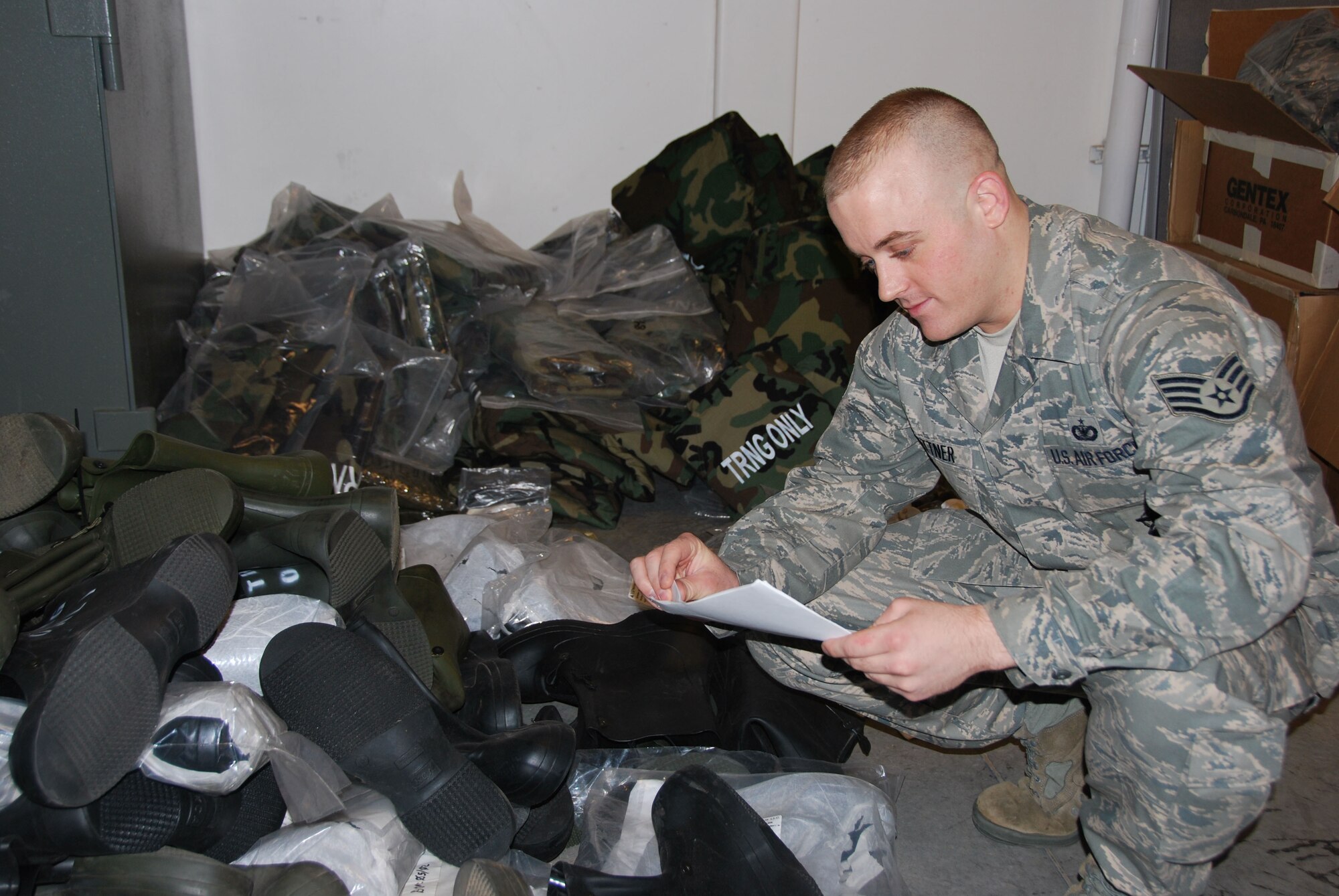Staff Sgt Ricky D. Buettner, a Security Forces Journeyman with the 507th Air Refueling Wing's Security Forces Squadron inspects his squadron's chemical protective equipment prior to storage.  Sergeant Buettner has been selected as the Air Force's Outstanding Security Forces Air Reserve Component NCO for the year.

