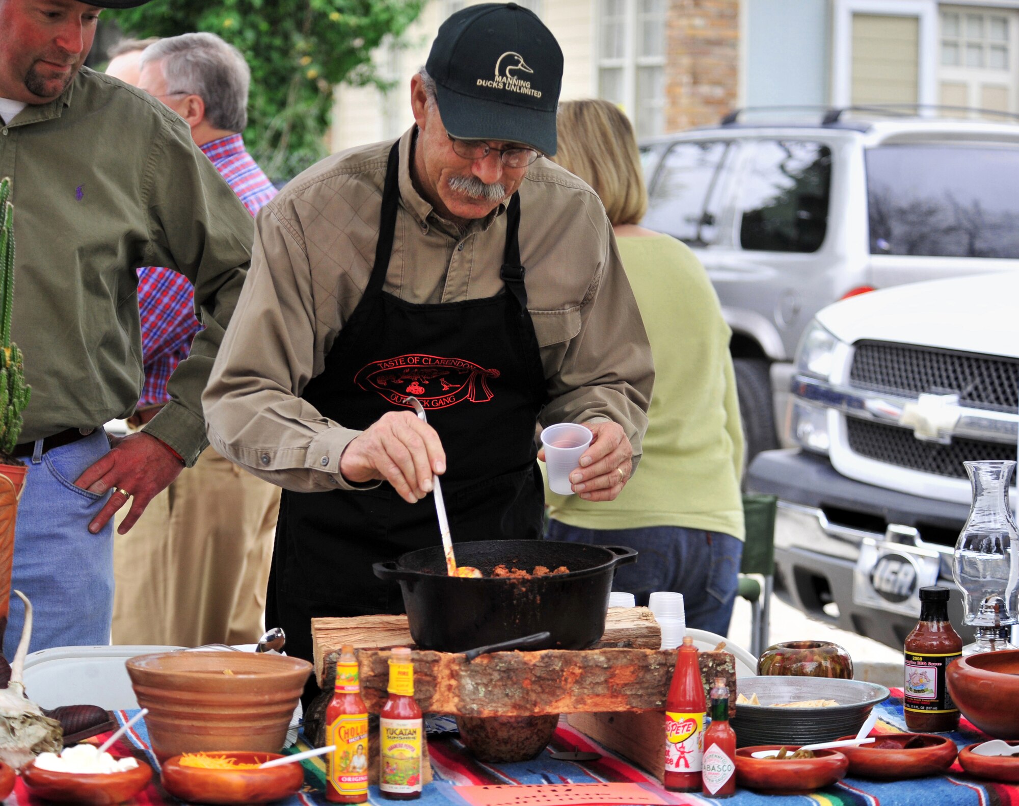 SUMTER, S.C. -- Jake Budden, from Manning, S.C., stirs his chili during the Sumter Chili Cook-off March 25. The cook-off was hosted by the Sumter County Museum and Young Professionals of Sumter. This was the first-ever Sumter Chili Cook-off featuring 25 different competitors and live music. (U.S. Air Force photo/Airman 1st Class Amber E. N. Jacobs) 