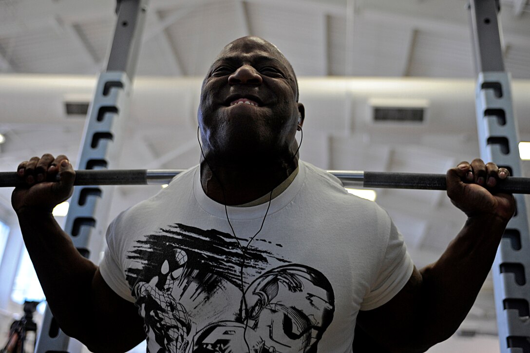 ELLSWORTH AIR FORCE BASE, S.D. -- Staff Sgt. Tywone Weston, 28th Maintenance Squadron jet engine mechanic, squats 455 pounds during the Bellamy Fitness Center powerhouse competition, March 25. All of the contestants were given three chances to lift their maximum weight in the three different lifts: squat, dead lift and bench press. (U.S. Air Force photo/Airman 1st Class Matthew Flynn)