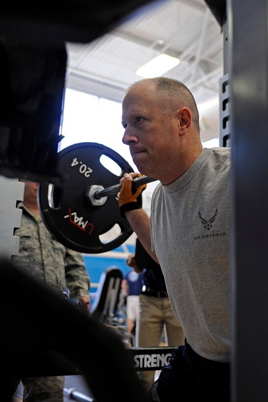 ELLSWORTH AIR FORCE BASE, S.D. -- Master Sgt. Loren Bonser, 28th Bomb Wing public affairs superintendent, performs a squat during the Bellamy Fitness Center powerhouse competition, March 25. Sergeant Bonser won the competition, lifting 21 percent more than his body weight. (U.S. Air Force photo/Airman 1st Class Matthew Flynn)