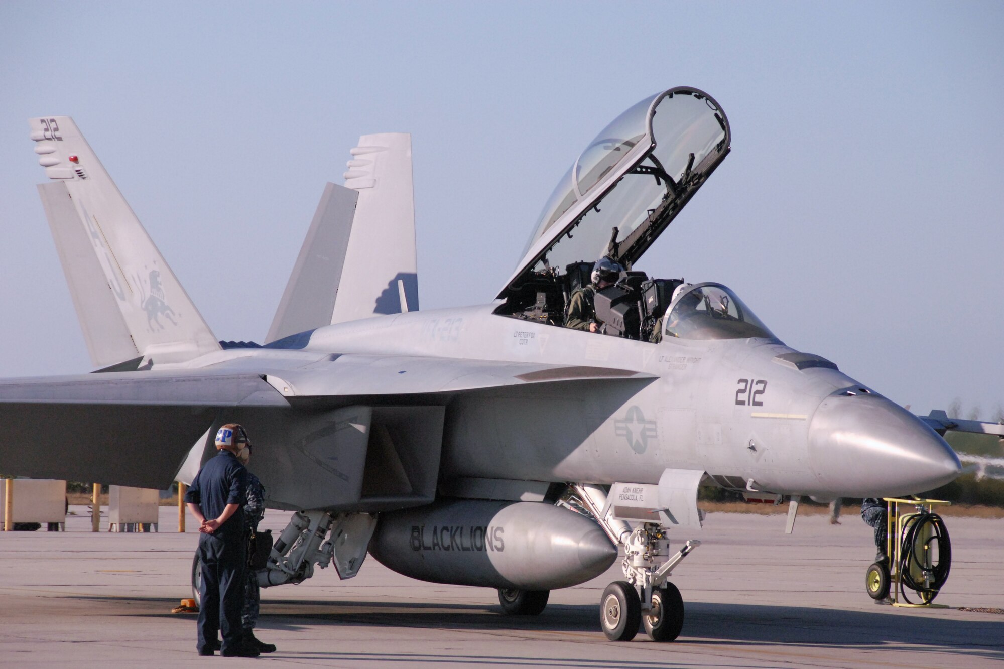 Navy airmen from the Navy Strike Fighter Squadron 213 (VFA-213) in Virginia Beach, VA, prepare to launch an F-18 Super Hornet from Naval Air Station, Key West, Fla., to dog fight an F-16 from the 115th Fighter Squadron based in Madison, Wis., in the skies south of NAS on March 24, 2010, as part of a two week  air-to-air combat skills training mission at NAS.  (U.S. Air Force photo by Airman 1st Class Ryan Roth, 115 FW/PA)