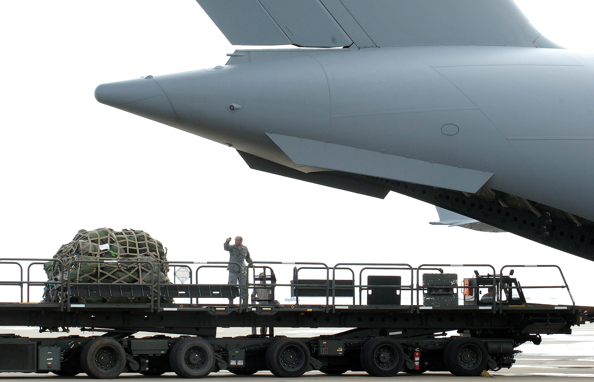 The 3rd Combat Communications Group deployed to Haiti in early February to establish communications for various U.S. forces providing relief to the earthquake stricken area. The 3rd Herd, as they are called, deployed with 94 tons of equipment that has helped them provide their customers with consistent communications by working nearly around the clock. (Air Force photo by Margo Wright)