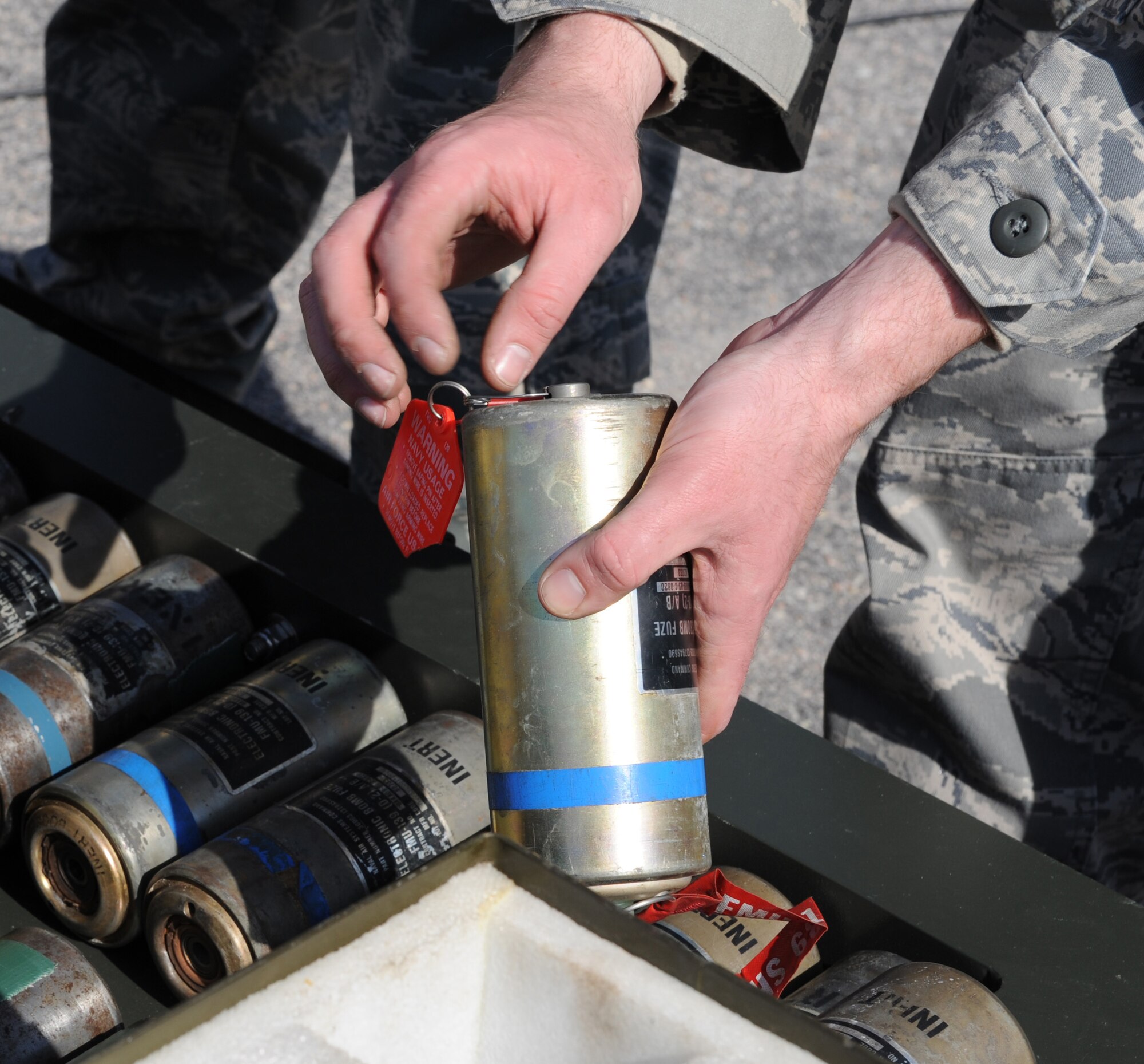 Staff Sgt. Kevin Johnson, 4th Equipment Maintenance Squadron conventional maintenance technician, inspects a GBU-38 training bomb fuse during a bomb build on Seymour Johnson Air Force Base, N.C., March 24, 2010. Airmen build training bombs periodically to maintain their proficiency for future deployments where they will deal with live munitions. Johnson hails from Fontana, Calif. (U.S. Air Force photo/Airman 1st Class Gino Reyes)