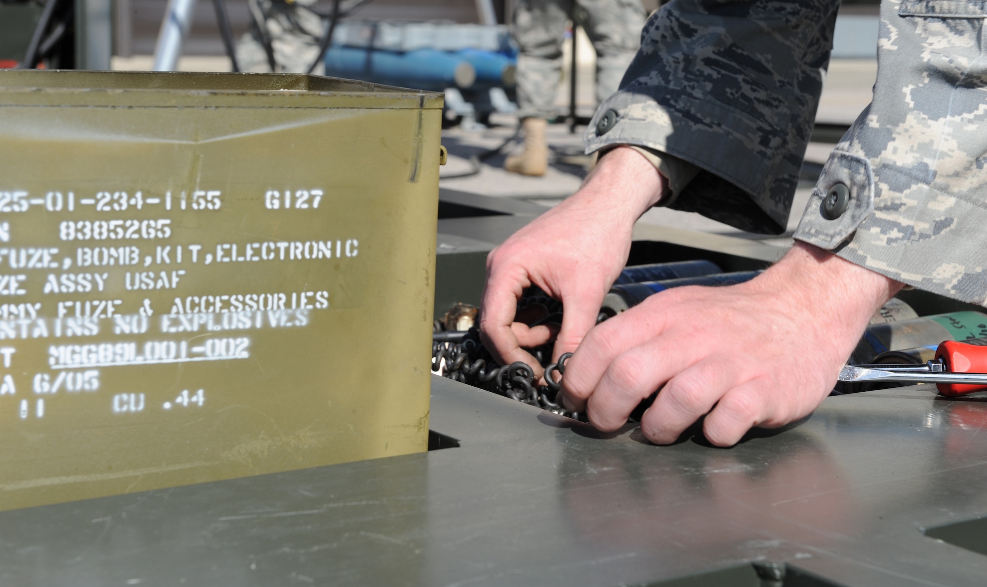 Senior Airman Zachary Jones, 4th Equipment Maintenance Squadron conventional maintenance technician, connects wire to a bomb fuse during a GBU-38 bomb build on Seymour Johnson Air Force Base, N.C., March 24, 2010. 4th EMS Airmen build approximately 28 GBU-38 training bombs during a bomb build. Jones hails from Chickamauga, Ga. (U.S. Air Force photo/Airman 1st Class Gino Reyes)