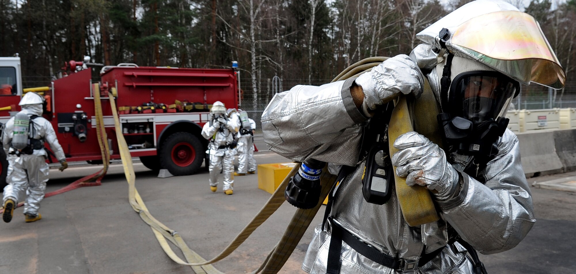 U.S. Air Force Senior Airman Nicholas Hayes, 886th Civil Engineer Squadron firefighter, prepares to put out a simulated fire during an exercise on Delta Base, Kapaun Air Station, Germany, March 25, 2010. The 886th CES firefighters conduct at least four exercises per month to ensure readiness in the event of real-world fires. (U.S. Air Force photo by Airman 1st Class Grovert Fuentes-Contreras)(Released)
