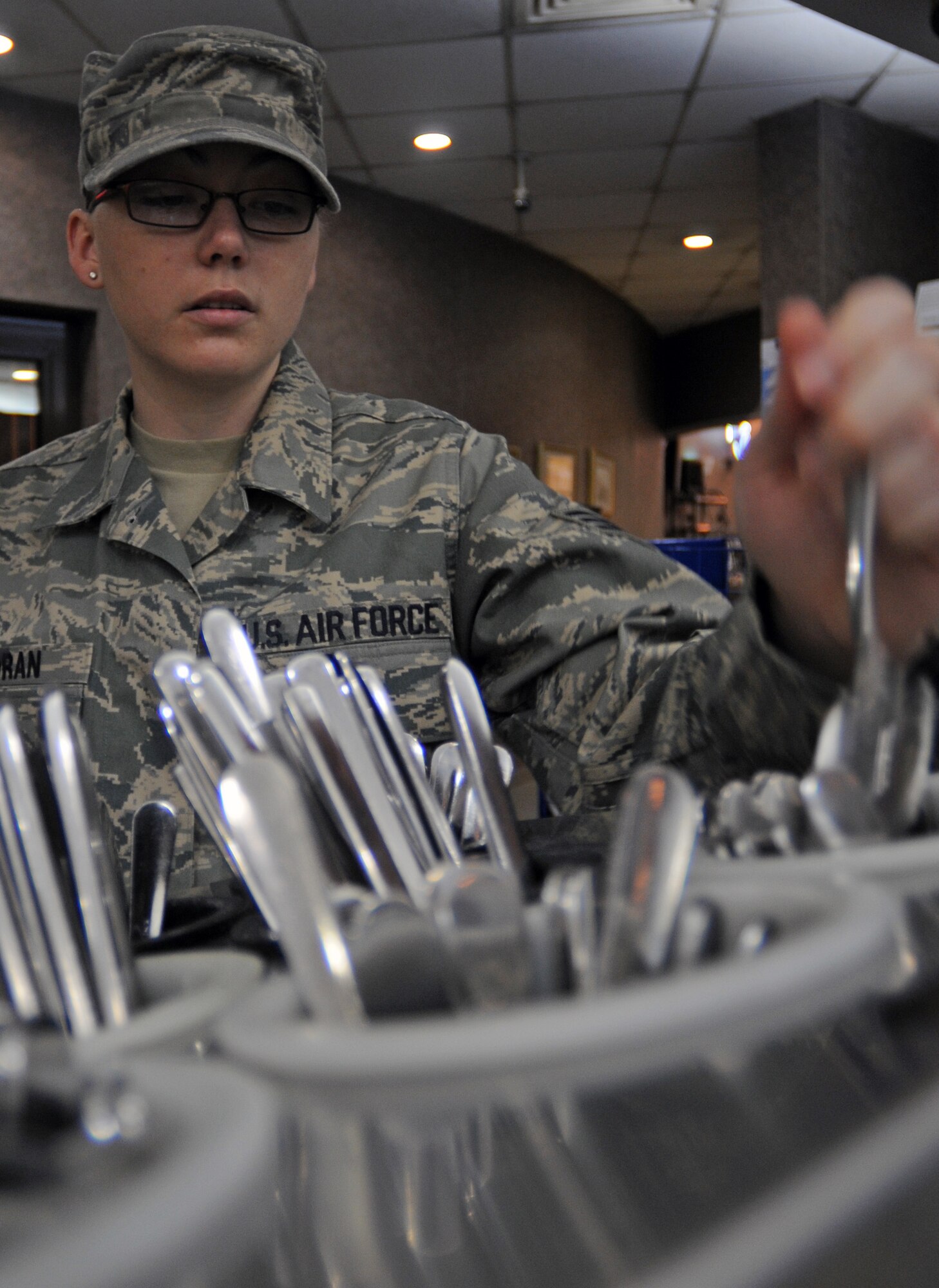 Senior Airman Christina Moran, 39th Medical Group Public Health technician, inspects silverware to ensure cleanliness inside the Sultan’s Inn at Incirlik Air Base, Turkey. Public Health has an array of responsibilities when it comes to keeping the base healthy including inspecting all facilities that serve food on base, ensuring the readiness of deploying Airmen and educating the public about safe sex. (U.S. Air Force photo/Senior Airman Sara Csurilla)