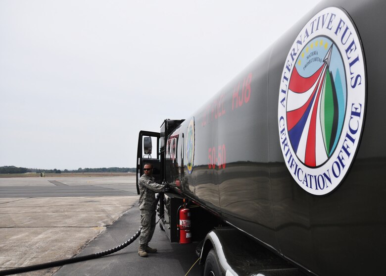 EGLIN AIR FORCE BASE, Fla. -- Airman 1st Class Nathan McFadden, 96th Logistics Readiness Squadron fuels specialist, pumps a 50/50 blend of Hydrotreated Renewable Jet and JP-8 into an A-10C Thunderbolt II for the first all-engine flight of an aircraft powered solely on a biomass-derived jet fuel blend.  The flight took place here March 25.   (U.S. Air Force photo/Samuel King Jr.)