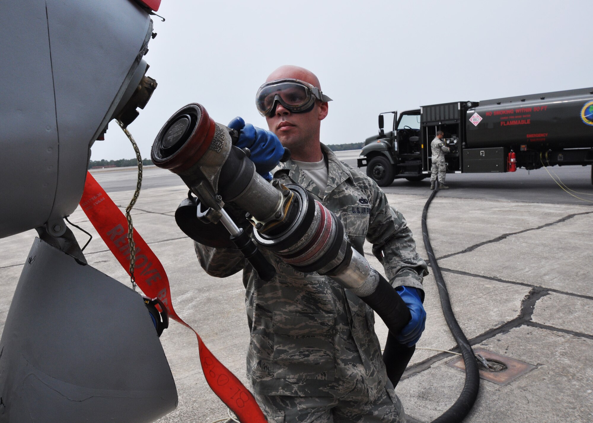 EGLIN AIR FORCE BASE, Fla. -- Staff Sgt. Rusty Jones, 40th Aircraft Maintenance Squadron crew chief, prepares to fuel the A-10C Thunderbolt II as it prepares for the first flight of an aircraft powered solely on a biomass-derived jet fuel blend. The A-10 was fueled with a 50/50 blend of Hydrotreated Renewable Jet and JP-8.  (U.S. Air Force photo/Samuel King Jr.)