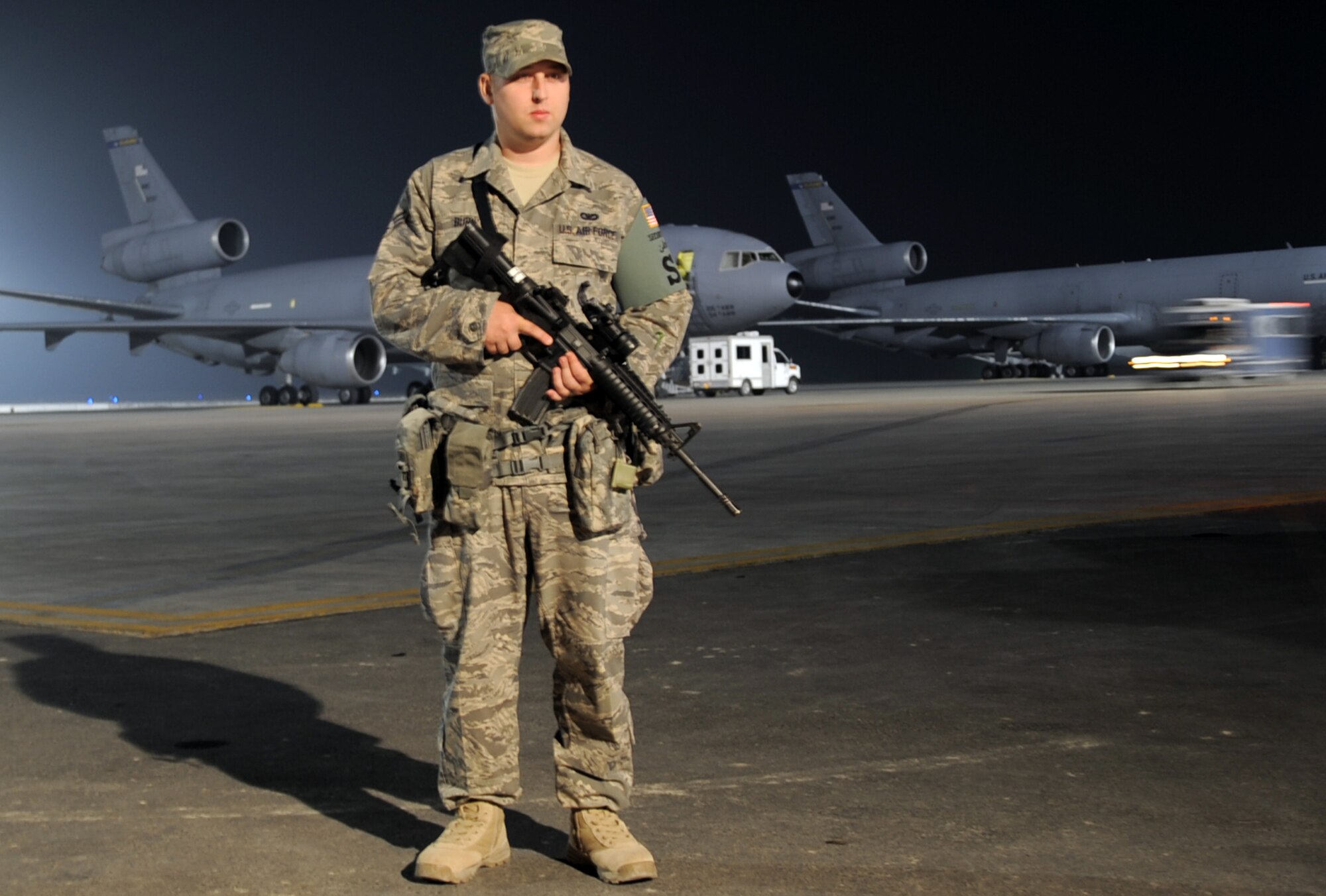 Senior Airman Christopher Burk, security forces journeyman with the 380th Expeditionary Security Forces Squadron, watches over the flightline at a non-disclosed base in Southwest Asia on Jan. 31, 2010. Security forces Airmen like Airman Burk are in charge of protecting and providing security for thousands of deployed service members and millions of dollars worth of deployed military assets and equipment. Airman Burk is deployed from the 81st Security Forces Squadron at Keesler Air Force Base, Miss., and his hometown is Ocean Springs, Miss.  (U.S. Air Force Photo/Master Sgt. Scott T. Sturkol/Released)