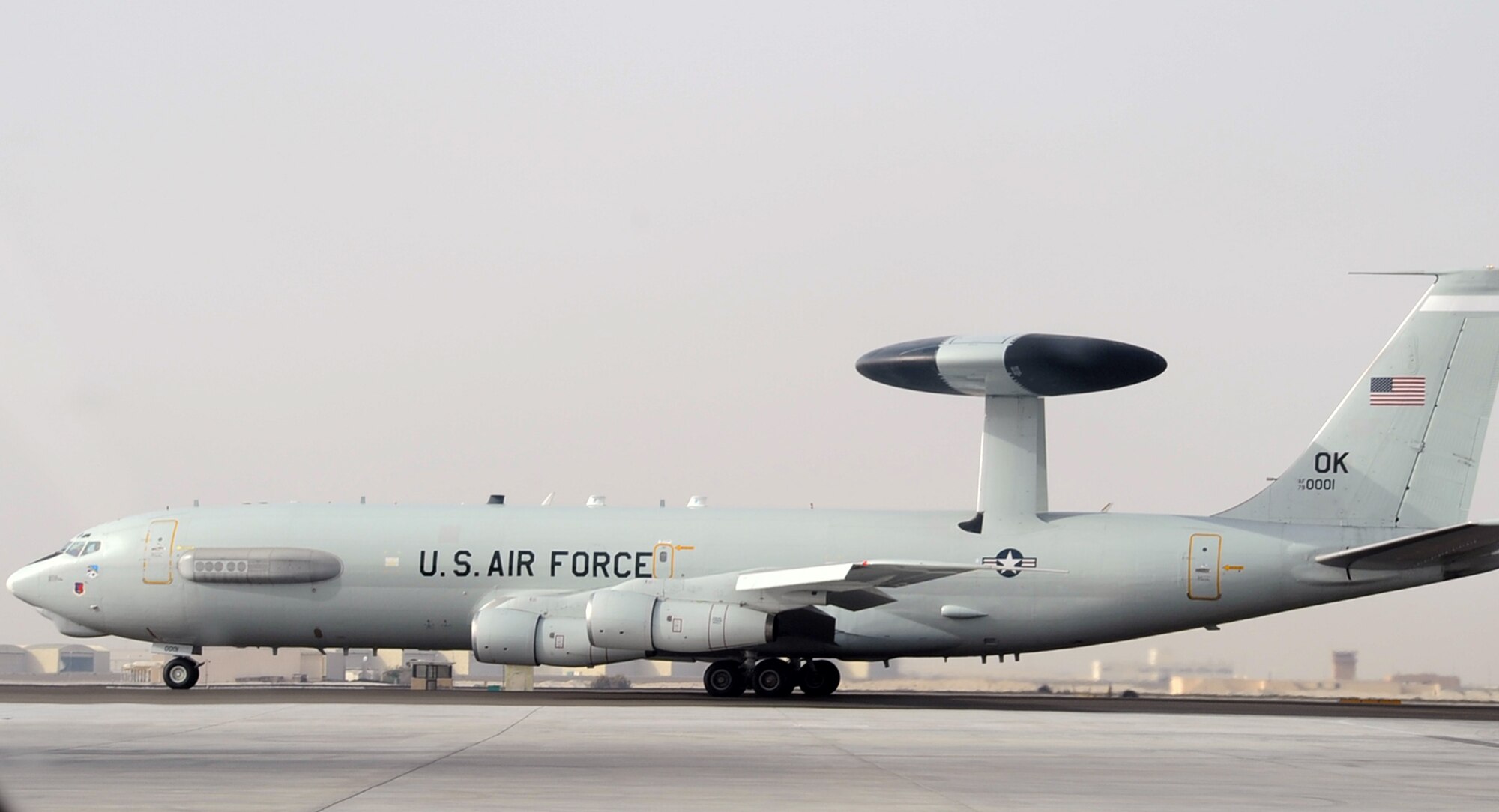 An E-3 Sentry Airborne Warning and Control System aircraft assigned to the 965th Expeditionary Airborne Air Control Squadron is guided down the runway for take-off by its flight crew en route to a combat mission during operations at a non-disclosed base in Southwest Asia on Feb. 11, 2010. The E-3 mission platform, according to its Air Force fact sheet, provides situational awareness of friendly, neutral and hostile activity, command and control of an area of responsibility, battle management of theater forces, all-altitude and all-weather surveillance of the battle space, and early warning of enemy actions during joint, allied and coalition operations. The 965th EAACS is a unit of the 380th Air Expeditionary Wing and supports operations Iraqi Freedom and Enduring Freedom and the Combined Joint Task Force-Horn of Africa. (U.S. Air Force Photo/Master Sgt. Scott T. Sturkol/Released)

