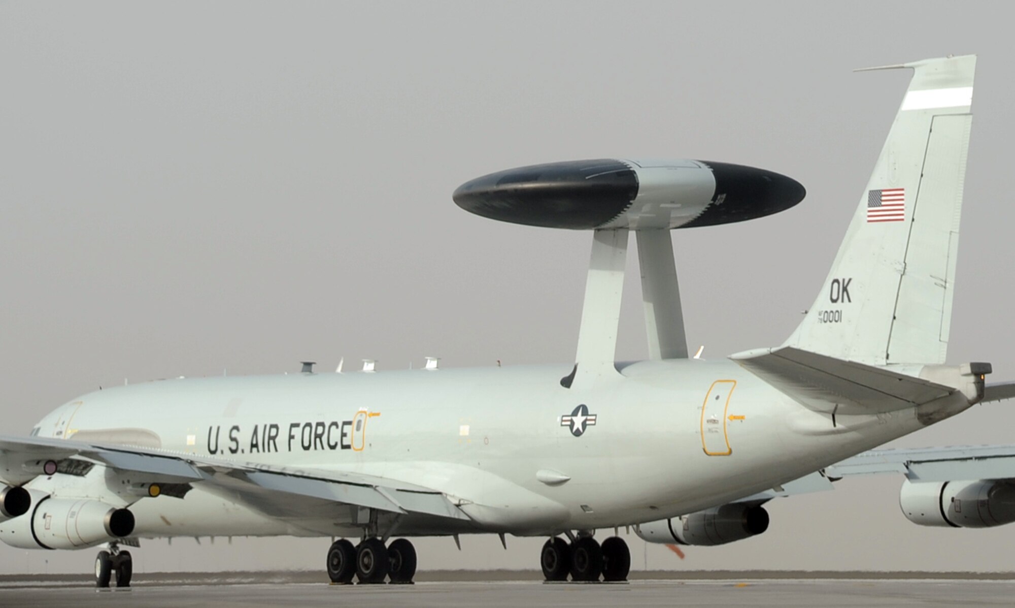 An E-3 Sentry Airborne Warning and Control System aircraft assigned to the 965th Expeditionary Airborne Air Control Squadron is guided down the runway for take-off by its flight crew en route to a combat mission during operations at a non-disclosed base in Southwest Asia on Feb. 11, 2010. The E-3 mission platform, according to its Air Force fact sheet, provides situational awareness of friendly, neutral and hostile activity, command and control of an area of responsibility, battle management of theater forces, all-altitude and all-weather surveillance of the battle space, and early warning of enemy actions during joint, allied and coalition operations. The 965th EAACS is a unit of the 380th Air Expeditionary Wing and supports operations Iraqi Freedom and Enduring Freedom and the Combined Joint Task Force-Horn of Africa. (U.S. Air Force Photo/Master Sgt. Scott T. Sturkol/Released)
