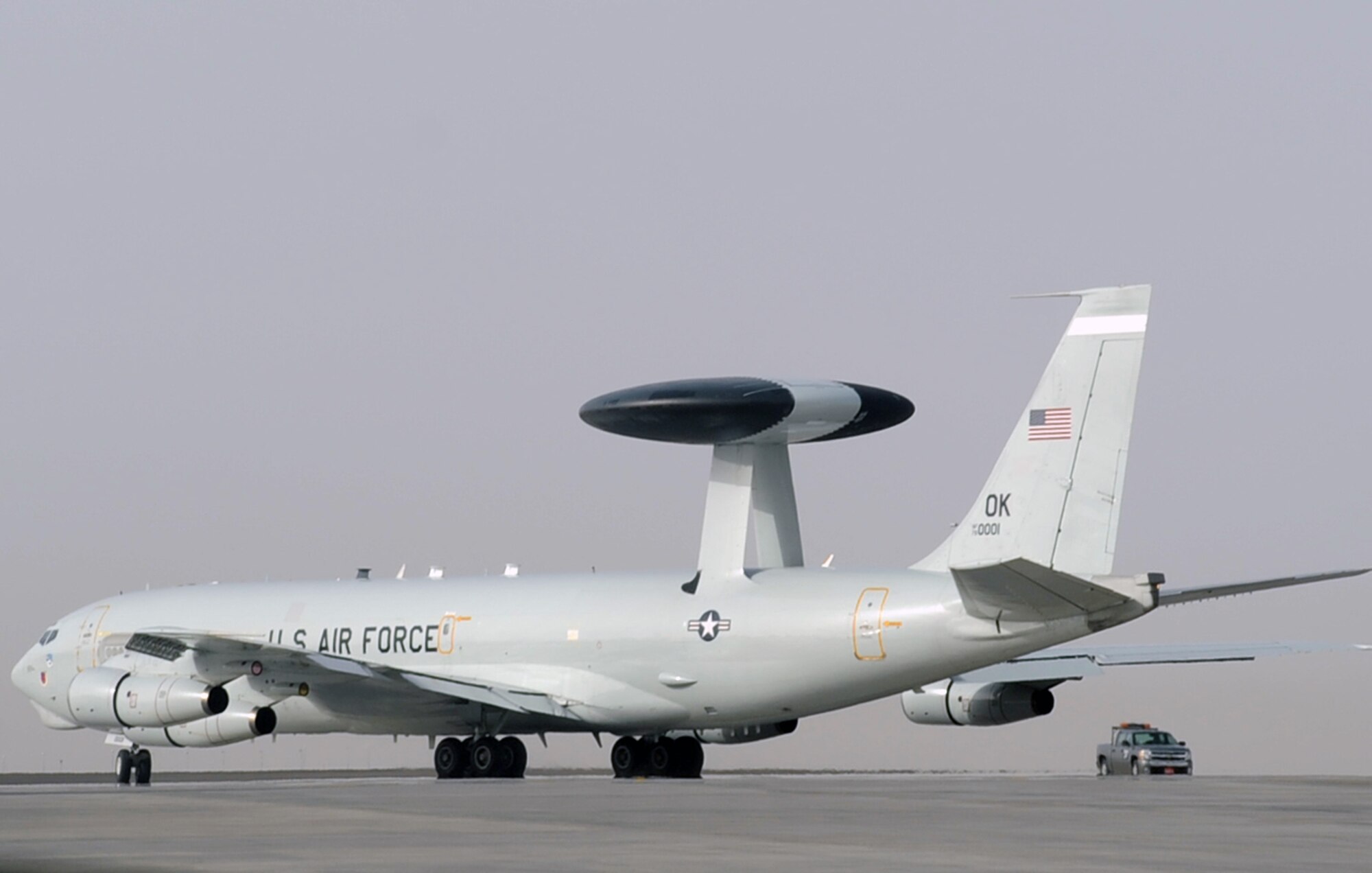 An E-3 Sentry Airborne Warning and Control System aircraft assigned to the 965th Expeditionary Airborne Air Control Squadron is guided down the runway for take-off by its flight crew en route to a combat mission during operations at a non-disclosed base in Southwest Asia on Feb. 11, 2010. The E-3 mission platform, according to its Air Force fact sheet, provides situational awareness of friendly, neutral and hostile activity, command and control of an area of responsibility, battle management of theater forces, all-altitude and all-weather surveillance of the battle space, and early warning of enemy actions during joint, allied and coalition operations. The 965th EAACS is a unit of the 380th Air Expeditionary Wing and supports operations Iraqi Freedom and Enduring Freedom and the Combined Joint Task Force-Horn of Africa. (U.S. Air Force Photo/Master Sgt. Scott T. Sturkol/Released)
