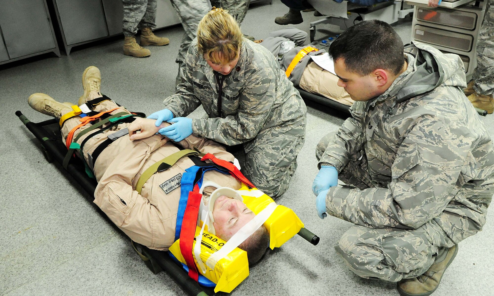 376th Air Expeditionary Wing personnel and Manas International Airport personnel participated in a Major Accident Response Exercise at the Transit Center at Manas, Kyrgyzstan, March 25, 2010.  Exercise participants included members of the MIA fire department and multiple agencies throughout the wing including the fire department, medical group, security forces, command post, aircraft maintenance, public affairs, legal, safety, mortuary affairs, chaplain, fuels, transportation, contracting, finance, air traffic control and civil engineering. (U.S. Air Force photo/Senior Airman Nichelle Anderson/released)