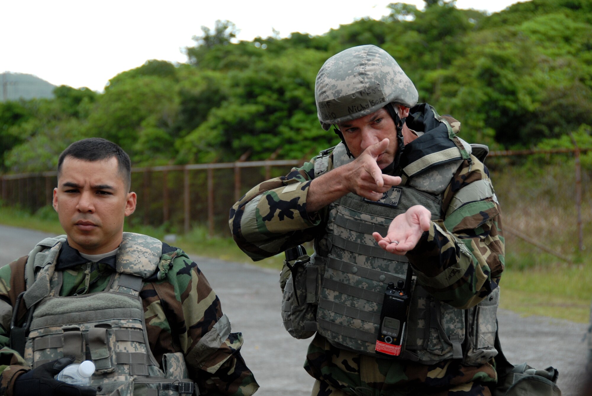 Master Sgt. David Nicholson, 18th Security Forces Squadron standardization and evaluation, trains Airmen proper combat patrol security at Area 1 during Beverly High 10-02 at Kadena Air Base, Japan, March 25. The 18th Wing is participating in a Local Operational Readiness Exercise March 22-26 to test the readiness of Kadena Airmen. (U.S. Air Force photo/Junko Kinjo)        