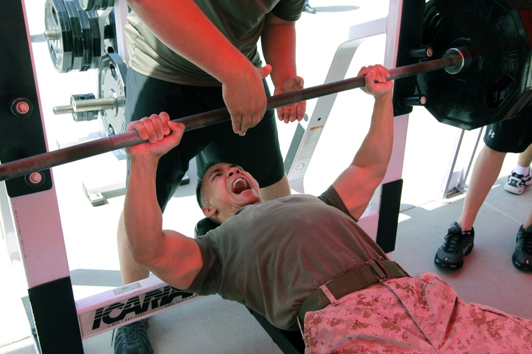 Capt. Anthony J. Nguyen, communications officer, Marine Communications Detachment, Commander, Naval Surface Forces, pushes up 315 pounds during the 2010 Camp Pendleton Bench Press Challenge Series at the Paige Fieldhouse, March 26. A total of 40 male and female contenders competed in 12 different categories.