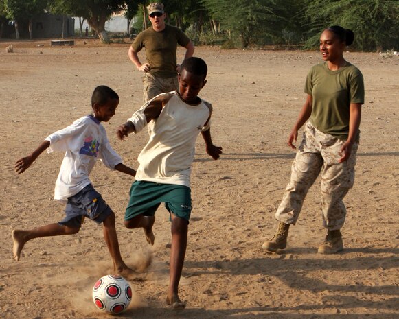 Marines from the 24th Marine Expeditionary Unit visit the National School for the Protection of Children and participate in a soccer game in Djibouti City, Djibouti, March 26, 2010.  Servicemembers volunteered to interact with orphans from the school as part of Camp Lemonier's community relations project.  Marines and Sailors of the 24th MEU are conducting a series of sustainment and joint training exercises in Djibouti while they are deployed with the Nassau Amphibious Ready Group as the theatre reserve force for Central Command.   (U.S. Marine Corps photo by Sgt. Alex C. Sauceda)