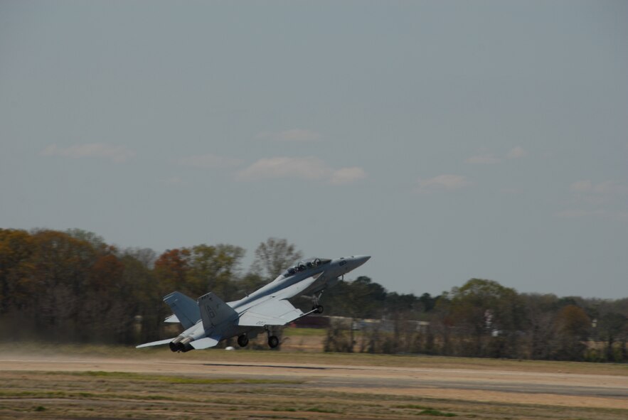 An F/A-18 Super Hornet takes off from the runway at the Thunder Over Alabama air show March 27, 2010. The Maxwell Air Force Base air show is celebrating 100 years of flight over Alabama. (U.S. Air Force photo/Bennett Rock)