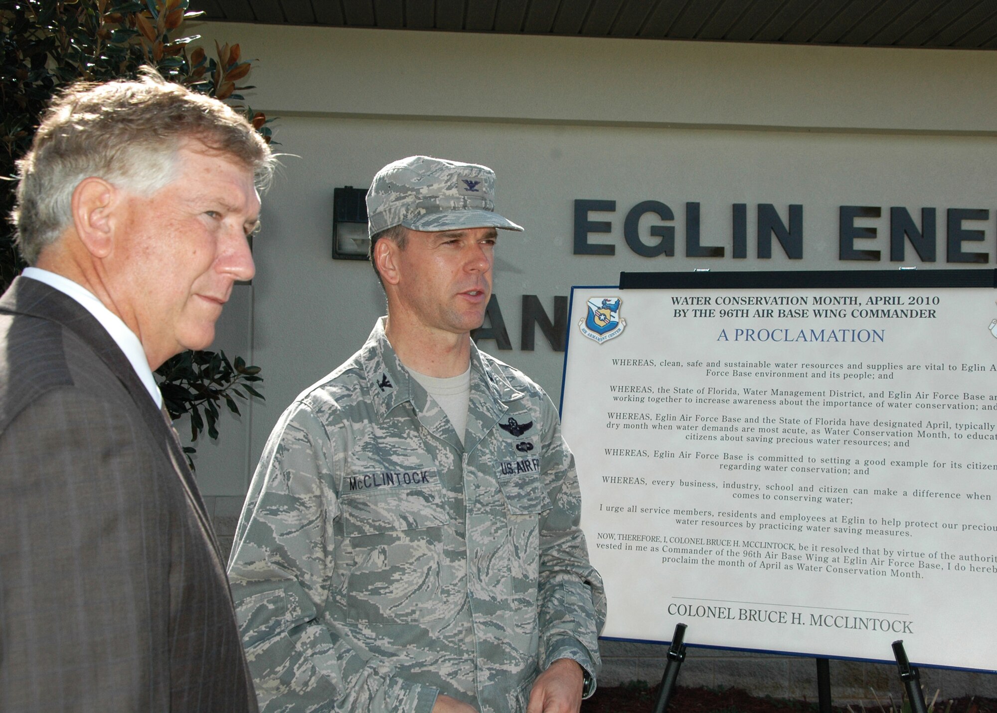 Terry Yonkers, Assistant Secretary of the Air Force for Installations, Environment and Logistics, stands with Col. Bruce McClintock, 96th Air Base Wing commander, prior to the signing of the proclamation beginning Water Conservation Month March 26 at Eglin Air Force Base, Fla.  Some tips for conserving water are: taking shorter showers, chilling water in the fridge, turning off the facet while brushing your teeth, handing wash dishes or limit pre-washing and installing low flow fixtures.  U.S. Air Force photo/Ashley M. Wright.