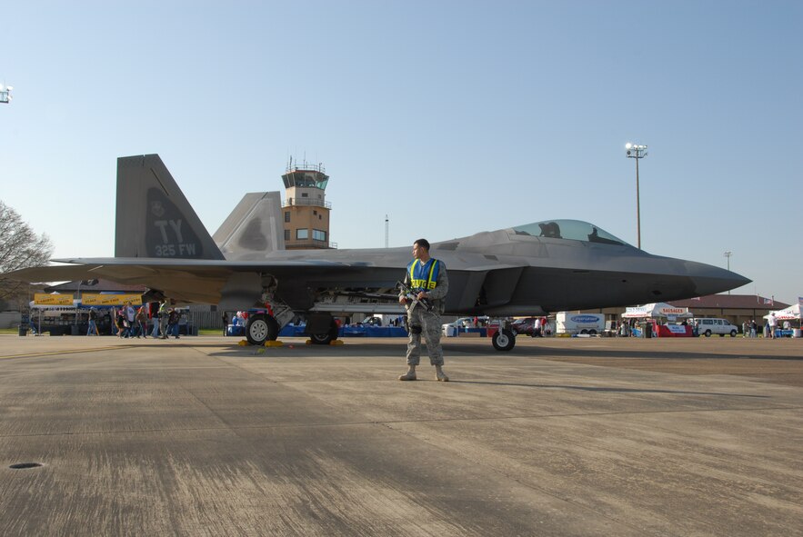 An F-22 Raptor sits on display at the Thunder Over Alabama air show March 27, 2010. The Maxwell Air Force Base air show is celebrating 100 years of flight over Alabama. (U.S. Air Force photo/Bennett Rock)