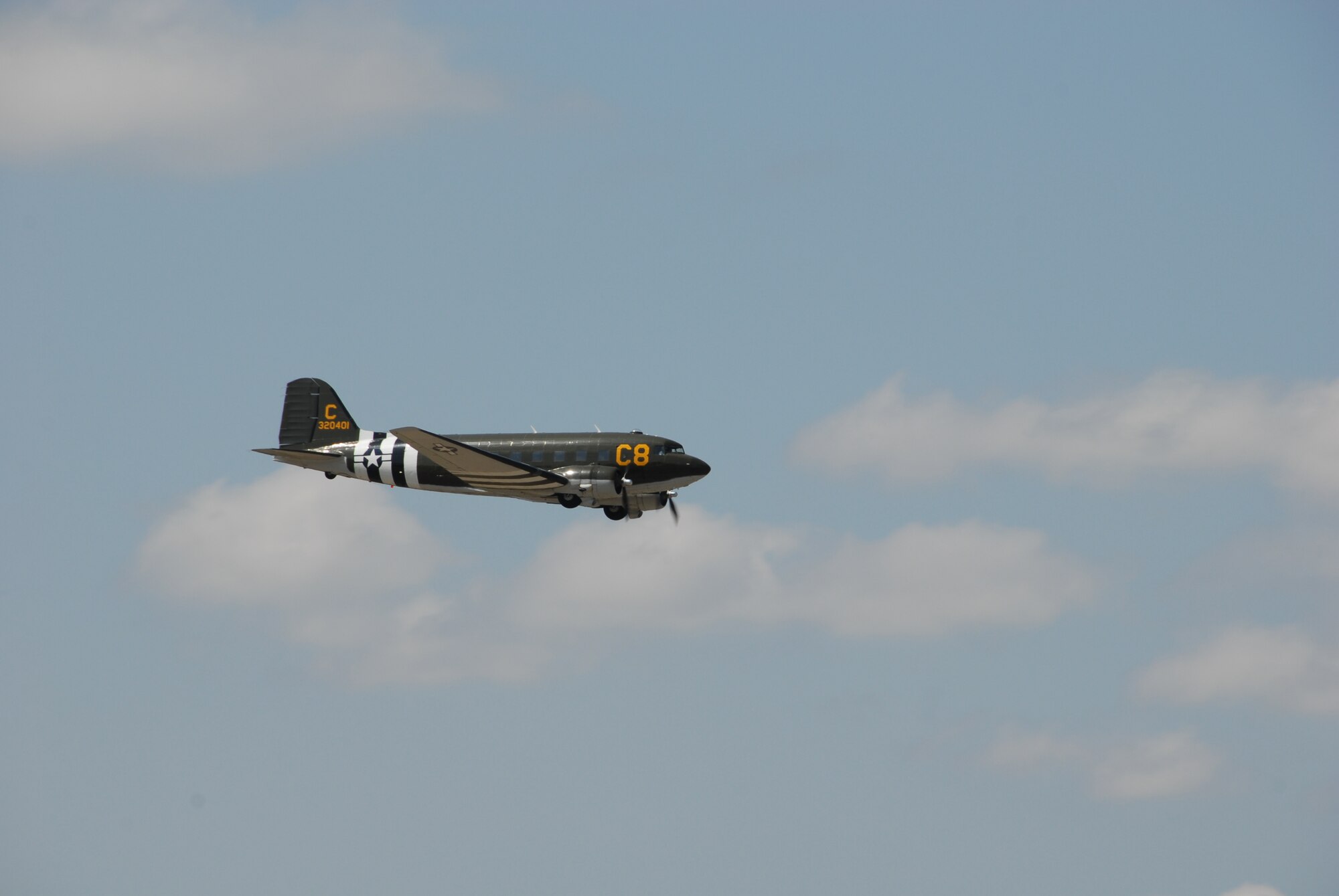 A C-47 Skytrain flies over the airfield at the Thunder Over Alabama air show March 27, 2010. The Maxwell Air Force Base air show is celebrating 100 years of flight over Alabama. (U.S. Air Force photo/Bennett Rock)
