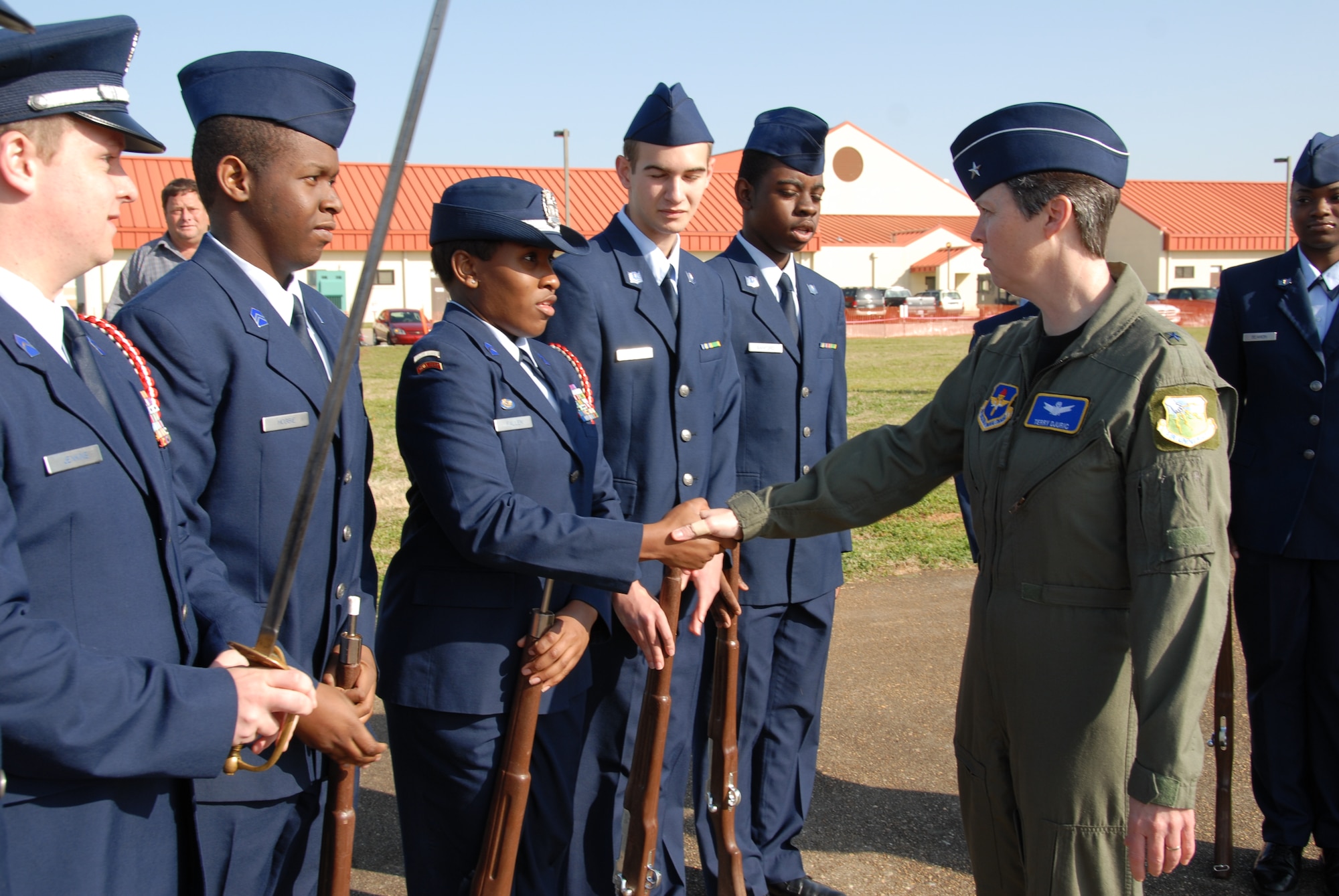 Brig. Gen. Teresa Djuric, Holm Center commander, meets with Air Force JROTC cadets from Robert E. Lee High School in Montgomery, Ala. at the Thunder Over Alabama air show at Maxwell Air Force Base on March 27, 2010. The Maxwell Open House and Air Show is celebrating 100 years of flight over Alabama. (U.S. Air Force photo/Jamie Pitcher)