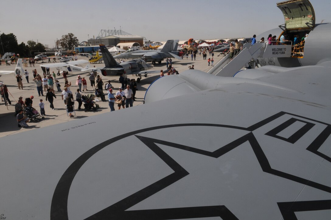 The overview of the Yuma Air Show reveals numerous static displays as seen from the wing of an Air Force KC-135 Stratotanker at the Marine Corps Air Station in Yuma, Ariz., March 27, 2010. Guests of the air show were allowed to step aboard the aircraft to look at the inside and get the crew's view.