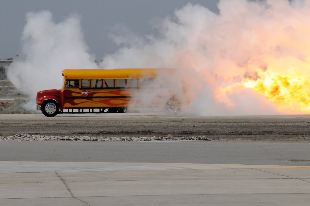 The Indy Boy's School Time Jet-Powered School Bus races down the flight line March 27, 2010, powered by a 42,000-horsepower General Electric J-79 jet engine straight out of an F-4 Phantom Fighter Jet. The act was one of many at the 48th annual Yuma air show at the Marine Corps Air Station in Yuma, Ariz. The event attracted approximately 20,000 visitors including the commandant and sergeant major of the Marine Corps.