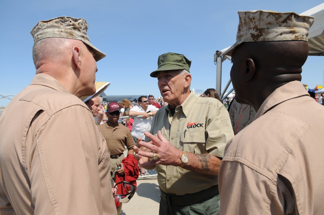 Former Marine and actor R. Lee Ermey speaks to the Commandant of the Marine Corps, Gen. James T. Conway, and the Sgt. Maj. of the Marine Corps Carlton Kent at the 2010 Yuma Air Show March 27, 2010. Ermey returned for his second year in a row while it was Conway’s first Yuma Air Show. It was 48th annual air show for the Marine Corps Air Station in Yuma, Ariz., and it attracted approximately 20,000 visitors.