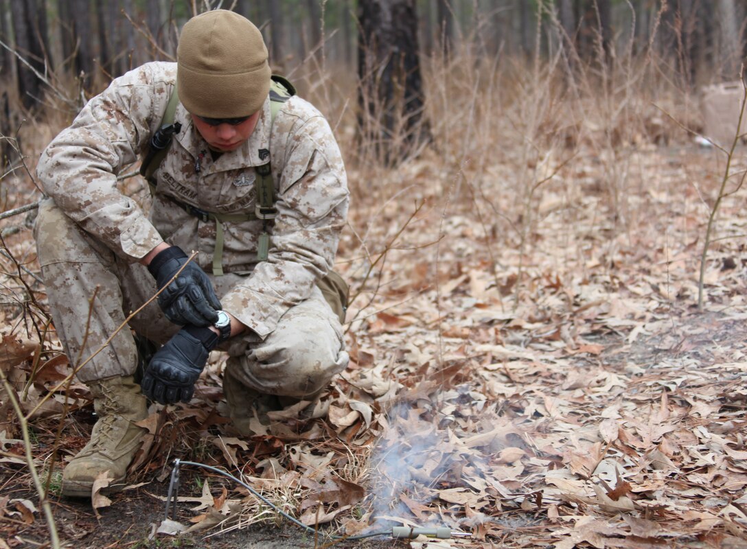 Explosive Ordinance Disposal and Combat Engineer Marines from 26th Marine Expeditionary Unit’s Combat Logistics Battalion 26 prepare their explosives prior to a demolition exercise aboard Ft. Pickett, Va., March 30, 2010. 26th MEU, which consists of Battalion Landing Team 3/8, Combat Logistics Battalion 26, and Marine Medium Tiltrotor Squadron 266, will spend the next six months training for their upcoming deployment. (Official United States Marine Corps Photo by Lance Cpl.  Santiago G. Colon Jr.) (Released)::r::::n::::r::::n::::r::::n::
