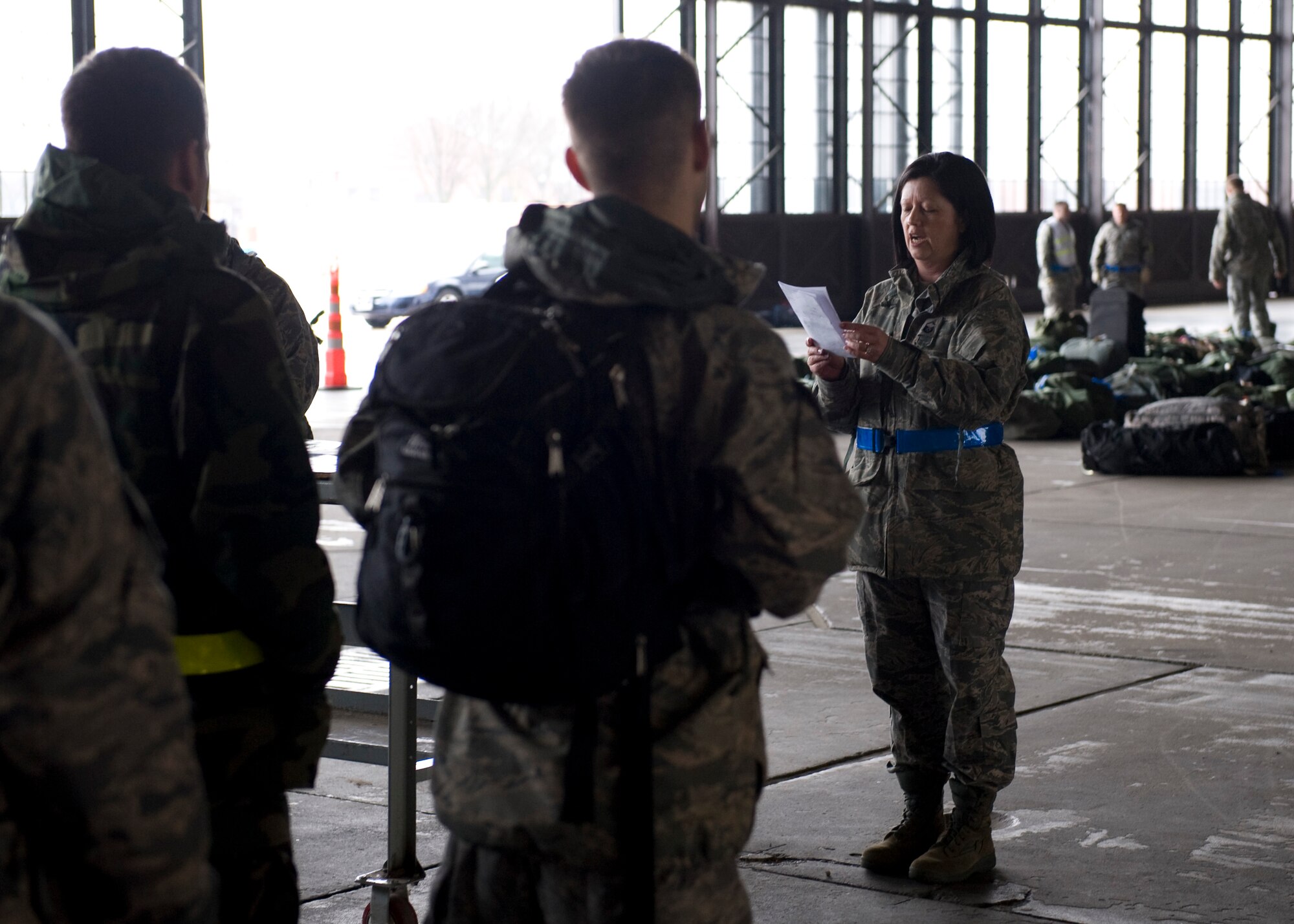 SCOTT AIR FORCE BASE, Ill. -- Master Sgt. Mona Bonick, with the 375th Force Support Squadron, takes final accountability of Airmen who returned from Volk Field Combat and Readiness Training Center, Wis., on March 28, 2010. (U.S. Air Force photo/Staff Sgt. Paul Villanueva II)