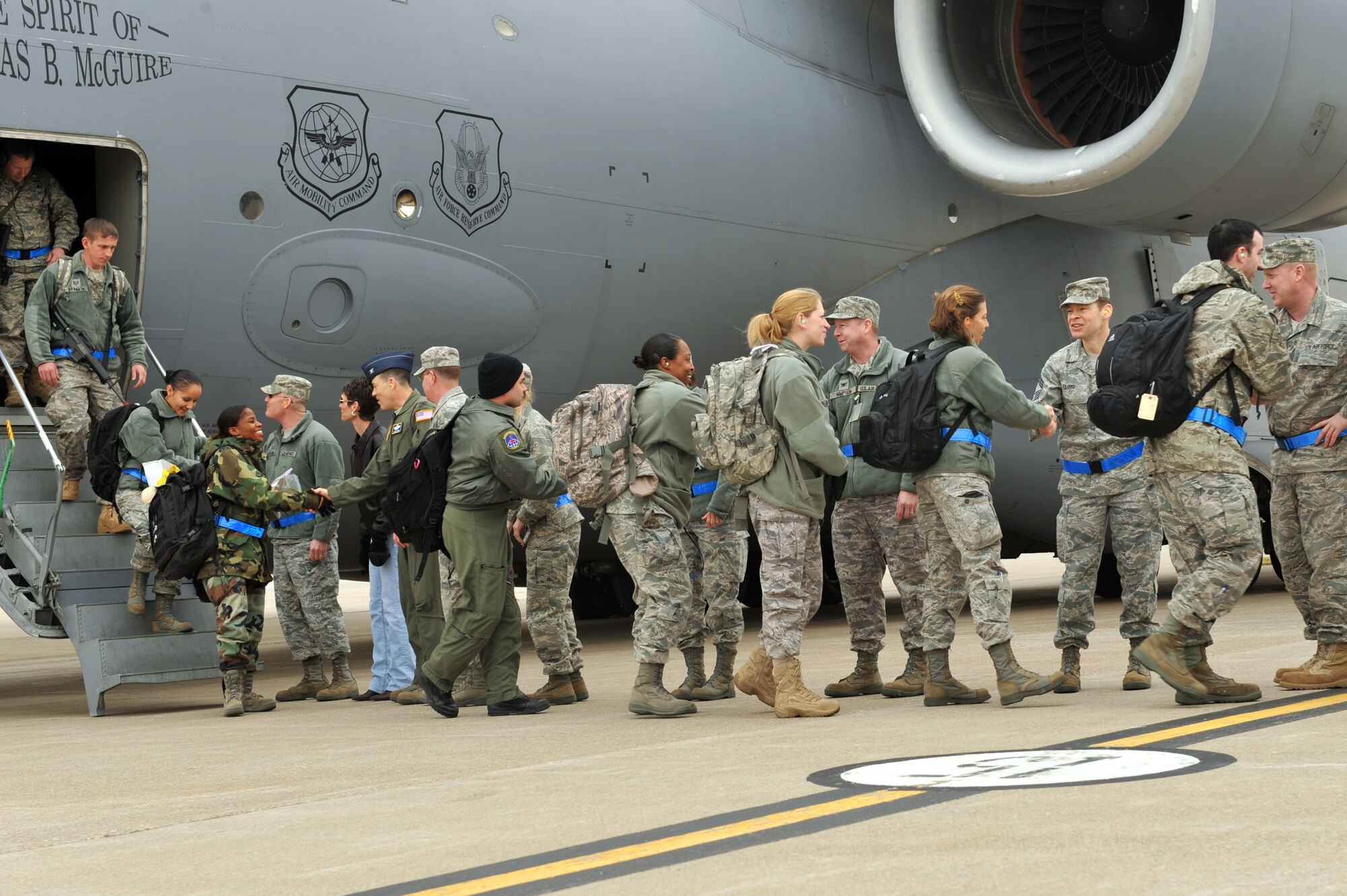 SCOTT AIR FORCE BASE, Ill. -- Leadership from the 375th Air Mobility Wing greet wing personnel returning from the Volk Field Combat Readiness and Training Center, Wis., March 27, 2010 as part of an Operational Readiness Inspection. The 375th AMW was being graded by the Air Mobility Command Inspector General to ensure they are able to respond to a global threat and deploy combat ready Airmen at a moment's notice. Results will be released April 2. (U.S. Air Force photo by Senior Airman Teresa M. Jennings)