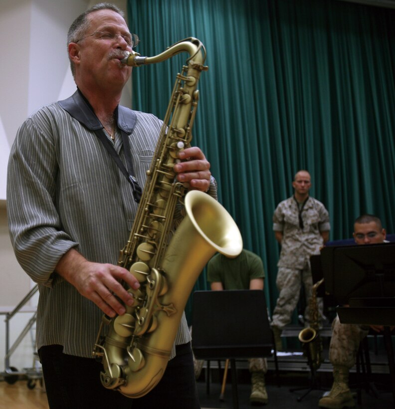 Ed Maina plays a set of notes on the saxophone during an improvisational jazz class he taught to the III Marine Expeditionary Force Band, March 29. The class went through the technical aspects of composition but ultimately summed up everything with a note that practice is essential.