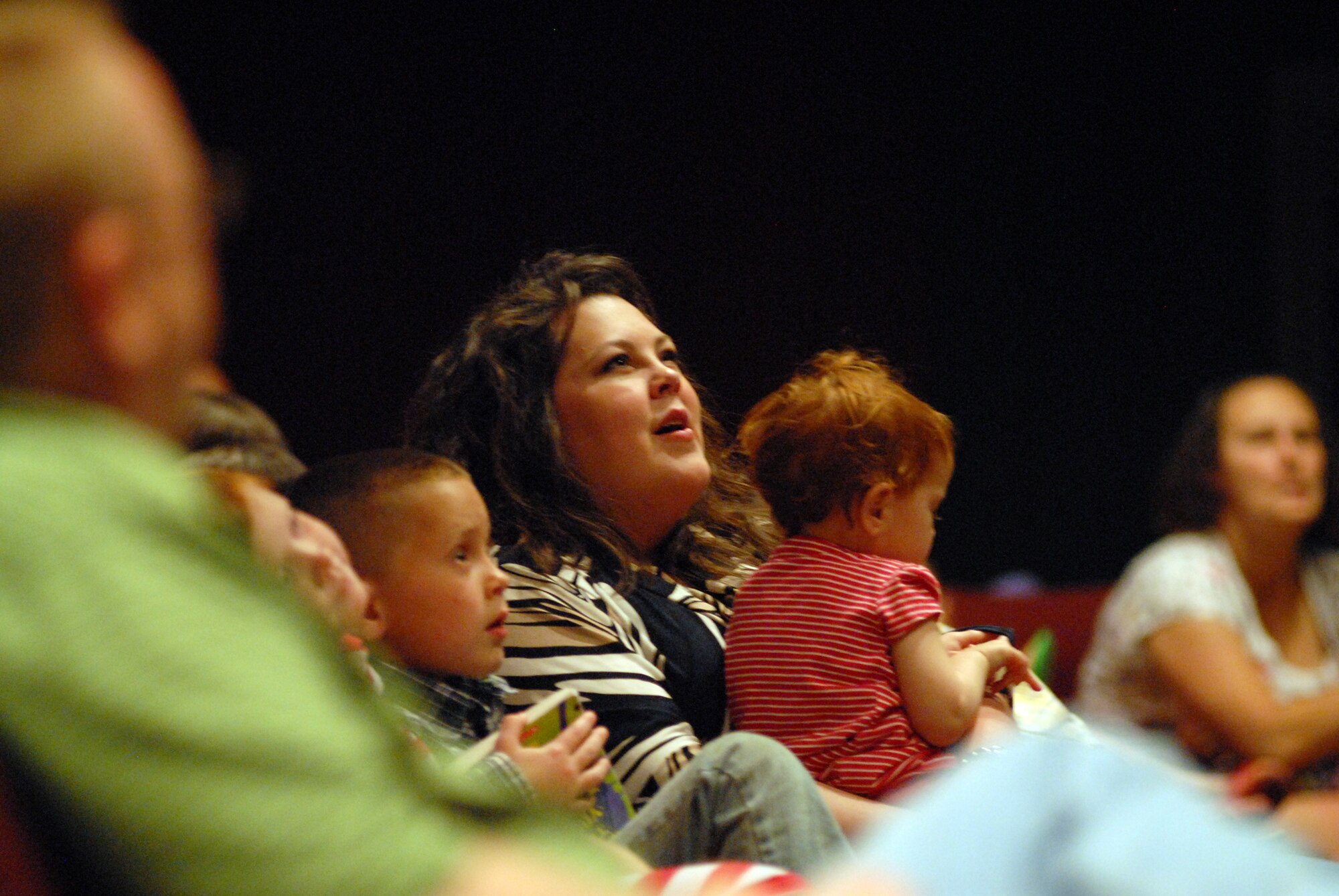 VANDENBERG AIR FORCE BASE, Calif. -- A crowd of parents and children of all ages filled the base theater  to watch and take part in magician Matt Fore’s magic show here Sunday, March 28, 2010. During the 45-minute show, Mr. Fore entertained the crowd with jokes and magic tricks. (U.S. Air Force photo/Airman 1st Class Angelina Drake)