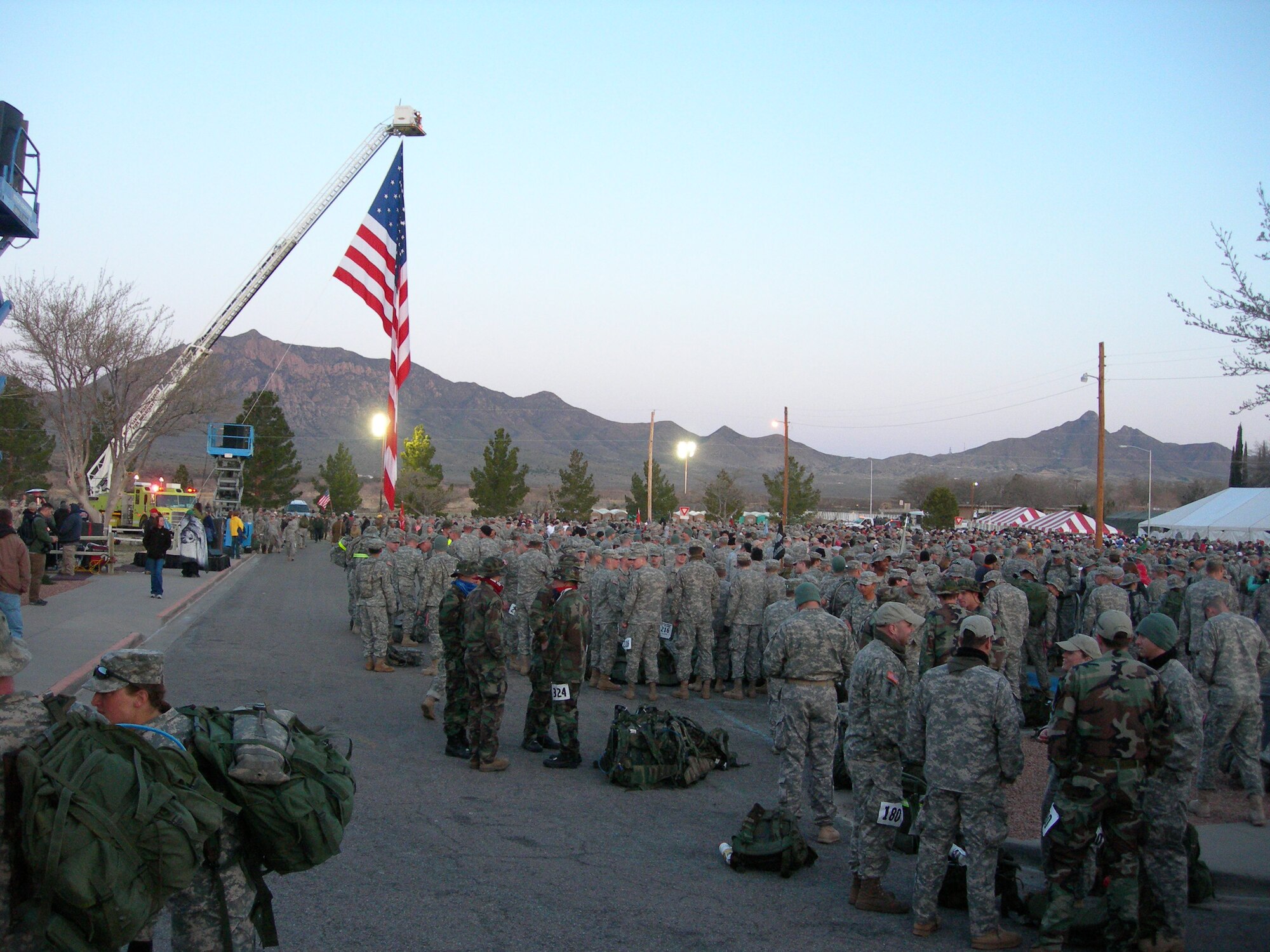 More than 5,700 participants stand by to begin the opening ceremonies at the Bataan Memorial Death March at White Sands Missile Range, N.M., March 21. The event included 22 survivors of the Bataan Death March in 1942. "One of the survivors sounded off during role call and it was so strong it sounded as if he was 20 years old again," said Jerry Haupt, 56th Security Forces Squadron standardized evaluations superintendant and retired SFS master sergeant. "The strength he still has blows my mind and that's why he was able to get through what he did." (U.S. Air Force photo courtesy 56th Security Forces Squadron)