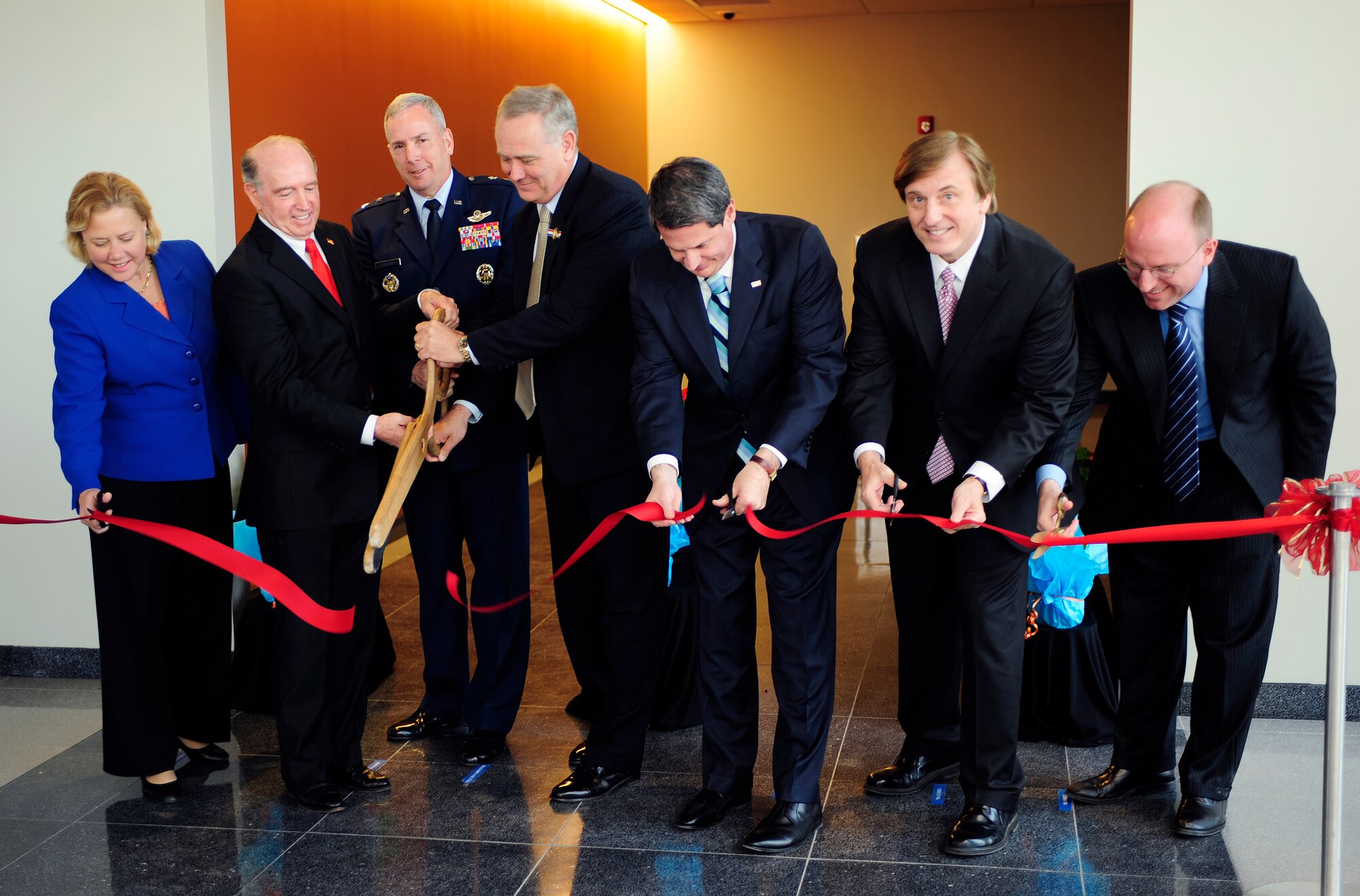 BARKSDALE AIR FORCE BASE, La. -- Maj. Gen. Floyd Carpenter, 8th Air Force commander, and local and state politicians cut the ribbon at the Cyber Innovation Center, the site of the Numbered Air Force’s new headquarters March 29. The newly constructed facility will be the home of the 8th AF for the next two years. (U.S. Air Force photo by Airman 1st Class Chad Warren) (RELEASED)