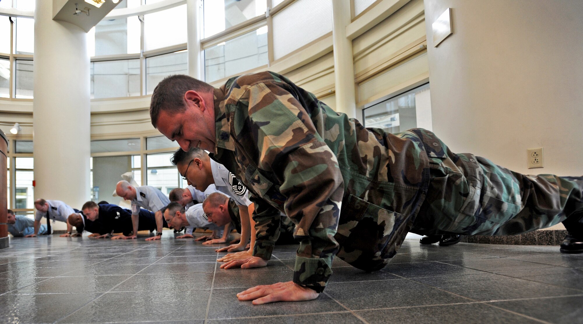 ELMENDORF AIR FORCE BASE, Alaska -- Lt. Col. Jeffrey Medland, 3rd Medical Operations Squadron, pushes himself to the limit for the 100-day million push-up challenge March 29. In an attempt to improve PT scores and unit camaraderie, 425 Arctic Medics did 1,184,957 push-ups in 100 days. (Air Force photo by Senior Airman Laura Turner)