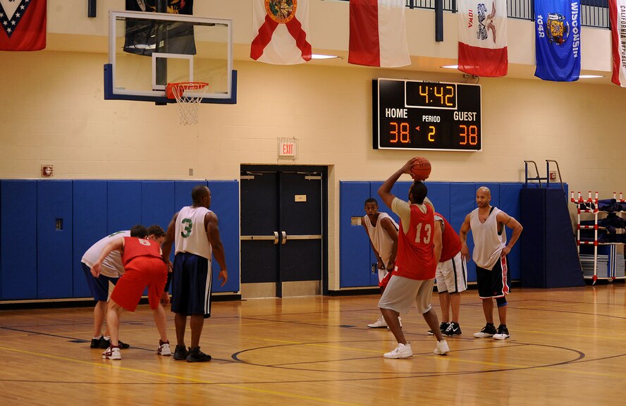 MOODY AIR FORCE BASE, Ga. -- Staff Sgt. Yusef Kennedy, 23rd Medical Group logistics, attempts to break a tie late in the second half of the championship game here March 26. After Sergeant Kennedy was unable to knock down the shot, the 23rd MDG never gained momentum to retake the lead, losing to the 23rd Maintenance Operations Squadron. (U.S. Air Force photo by Airman 1st Class Joshua Green/RELEASED)  