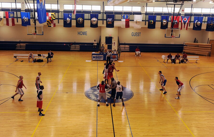 MOODY AIR FORCE BASE, Ga. -- The 23rd Medical Group and 23rd Maintenance Operations Squadron tip-off during the championship game held at the Freedom I Fitness Center basketball court March 26. They squared off for the right to be called champions of the intramural basketball league 2010 season at Moody. (U.S. Air Force photo by Airman 1st Class Joshua Green/RELEASED)